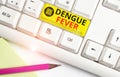 Text sign showing Dengue Fever. Conceptual photo infectious disease caused by a flavivirus or aedes mosquitoes White pc