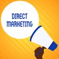 Text sign showing Direct Marketing. Conceptual photo business of selling products or services to public Hand Holding
