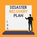 Text sign showing Disaster Recovery Plan. Conceptual photo having backup measures against dangerous situation Back view young man Royalty Free Stock Photo