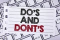 Text sign showing Do'S And Don'Ts. Conceptual photo What can be done and what cannot be knowing right wrong written on Notebook