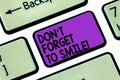 Text sign showing Don T Forget To Smile. Conceptual photo Be always cheerful smiley spread and show happiness Keyboard