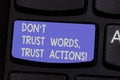 Text sign showing Don T Trust Words Trust Actions. Conceptual photo Less talking more things done action taken Keyboard