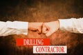 Text sign showing Drilling Contractor. Business approach contract their services mainly for drilling wells Two