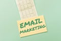 Text sign showing Email Marketing. Business concept Sending a commercial message to a group of showing using mail