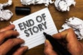 Text sign showing End Of Story. Conceptual photo Emphasize that nothing to add Literature writing Journalism Man holding marker no Royalty Free Stock Photo