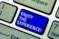 Text sign showing Enjoy The Experience. Conceptual photo Taking pleasure in the situation that you are in Keyboard key Royalty Free Stock Photo