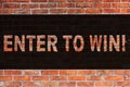 Text sign showing Enter To Win. Conceptual photo Award Reward Prize given for visiting a website Chance Giveaway Brick