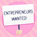 Text sign showing Entrepreneurs Wanted. Conceptual photo looking for a demonstrating willing to start a business Hand