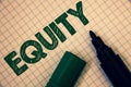 Text sign showing Equity. Conceptual photo Value of a company divided into equal parts owned by shareholders Squared paper open ma