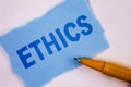Text sign showing Ethics. Conceptual photo Maintaining equality balance among others having moral principles written on Tear Blue