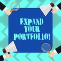 Text sign showing Expand Your Portfolio. Conceptual photo Define the new company s is goals and success metrics Hu analysis Hands