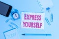 Text sign showing Express Yourself. Conceptual photo to communicate or reveal one s is thoughts or feelings Alarm clock