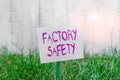 Text sign showing Factory Safety. Conceptual photo minimize risk of worker injury while doing production tasks Plain empty paper Royalty Free Stock Photo