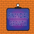 Text sign showing Financial Growth. Conceptual photo increase in finances of an organization or individual Clipboard