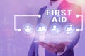 Text sign showing First Aid. Conceptual photo Practise of healing small cuts that no need for medical training. Royalty Free Stock Photo