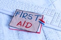 Text sign showing First Aid. Conceptual photo Practise of healing small cuts that no need for medical training notebook Royalty Free Stock Photo