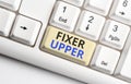 Text sign showing Fixer Upper. Conceptual photo house in need of repairs used chiefly connection with purchase White pc Royalty Free Stock Photo