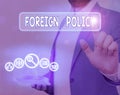 Text sign showing Foreign Policy. Conceptual photo a government strategy in dealing with other nations