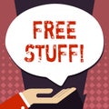 Text sign showing Free Stuff. Conceptual photo giveaways offered by vendors trade shows to encourage attendees Palm Up