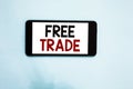 Text sign showing Free Trade. Conceptual photo The ability to buy and sell on your own terms and means Cell phone white screen ove