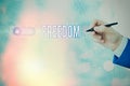 Text sign showing Freedom. Conceptual photo liberty rather than in confinement or under physical restraint