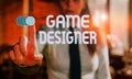 Text sign showing Game Designer. Conceptual photo Campaigner Pixel Scripting Programmers Consoles 3D Graphics Blurred Royalty Free Stock Photo