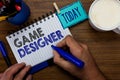 Text sign showing Game Designer. Conceptual photo Campaigner Pixel Scripting Programmers Consoles 3D Graphics Man holding marker n