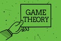 Text sign showing Game Theory. Conceptual photo branch of mathematics concerned with analysis of strategies Man hand holding paper