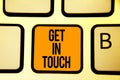 Text sign showing Get In Touch. Conceptual photo Stay in contact Constant Communication Interaction Bonding Keyboard orange key In