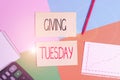 Text sign showing Giving Tuesday. Conceptual photo international day of charitable giving Hashtag activism Office appliance