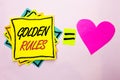 Text sign showing Golden Rules. Conceptual photo Regulation Principles Core Purpose Plan Norm Policy Statement written on Yellow S
