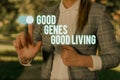 Text sign showing Good Genes Good Living. Conceptual photo Inherited Genetic results in Longevity Healthy Life Woman