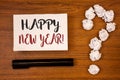 Text sign showing Happy New Year Motivational Call. Conceptual photo Greeting Celebrating Holiday Fresh Start Ideas on paper woode