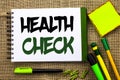 Text sign showing Health Check. Conceptual photo Medical Examination Diagnosis Tests to prevent diseases written on Notebook Book