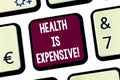 Text sign showing Health Is Expensive. Conceptual photo take care body eat healthy play sport prevent injury Keyboard