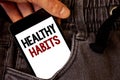 Text sign showing Healthy Habits. Conceptual photo Good nutrition diet take care of oneself Weight Control Text two words on white Royalty Free Stock Photo