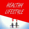 Text sign showing Healthy Lifestyle. Conceptual photo Live Healthy Engage in physical activity and exercise Two men Royalty Free Stock Photo