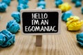 Text sign showing Hello I am An Egomaniac. Conceptual photo Selfish Egocentric Narcissist Self-centered Ego Paperclip hold written