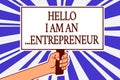 Text sign showing Hello I Am An ...Entrepreneur. Conceptual photo person who sets up a business or startups Man hand holding poste