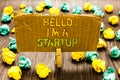 Text sign showing Hello I am A Startup. Conceptual photo Entrepreneur starting business Presenting New project Paperclip grip card