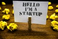 Text sign showing Hello I am A Startup. Conceptual photo Entrepreneur starting business Presenting New project Paperclip grip whit