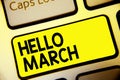 Text sign showing Hello March. Conceptual photo musical composition usually in duple or quadruple with beat Keyboard yellow key In