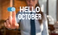 Text sign showing Hello October. Conceptual photo Last Quarter Tenth Month 30days Season Greeting Blurred woman in the Royalty Free Stock Photo