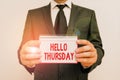 Text sign showing Hello Thursday. Conceptual photo the greeting used to welcome the day after wednesday Male human wear formal Royalty Free Stock Photo