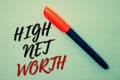 Text sign showing High Net Worth. Conceptual photo having high-value Something expensive A-class company Pen cool background Ideas Royalty Free Stock Photo