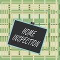 Text sign showing Home Inspection. Conceptual photo Examination of the condition of a home related property Stamp stuck binder Royalty Free Stock Photo