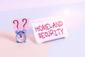 Text sign showing Homeland Security. Conceptual photo federal agency designed to protect the USA against threats Mini size alarm