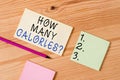 Text sign showing How Many Calories Question. Conceptual photo asking how much energy our body could get from it Colored