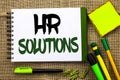 Text sign showing Hr Solutions. Conceptual photo Recruitment Solution Consulting Management Solving Onboarding written on Notebook