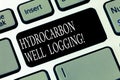 Text sign showing Hydrocarbon Well Logging. Conceptual photo record of the geologic formations of a borehole Keyboard key